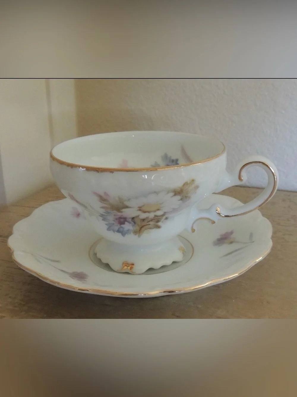 Occupied Japan Porcelain Floral Teacup and Saucer with Gold Trim